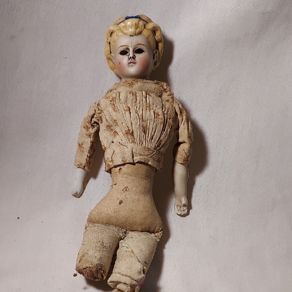 Antique China Head Doll with Blonde Hair & Blue Ribbon in Hair Partial Body